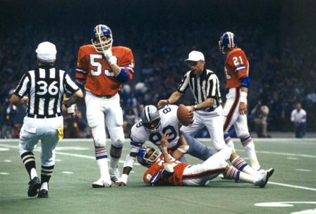 Dallas Cowboys vs. Denver Broncos at Super Bowl XII in New Orleans, Cowboys players DuPree and Staubach with and Broncos player Jackson