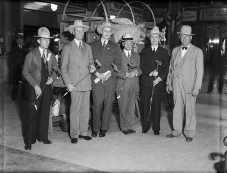 Elliott Roosevelt and J. R. (Red) Wright with others at Sweetwater chuckwagon in Texas Hotel