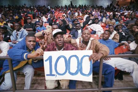 Dunbar High School vs. O.D. Wyatt High School basketball game, fans rooting for coach Robert Hughes' 1,000 career win