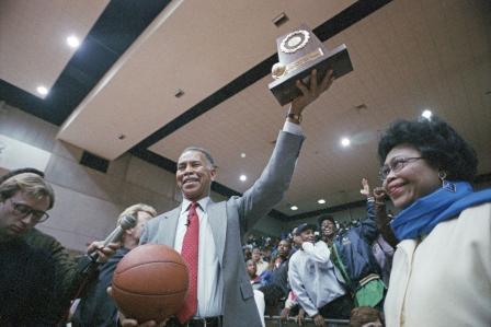Dunbar High School basketball coach Robert Hughes celebrating 1,000 career wins