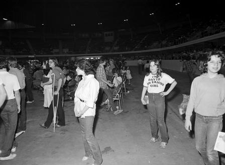 Wrestling at Will Rogers Coliseum; fan wearing shirt reading "I'm David Von Erich's Girl"