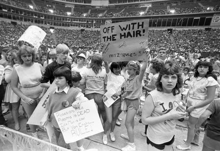 Second annual David Von Erich Parade of Champions; fans with signs