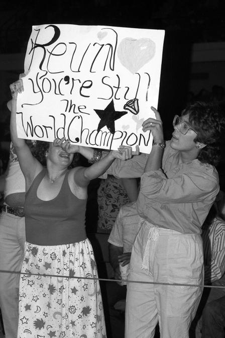 Wrestling at Will Rogers Coliseum; Al Perez and Kevin Von Erich, fan with sign