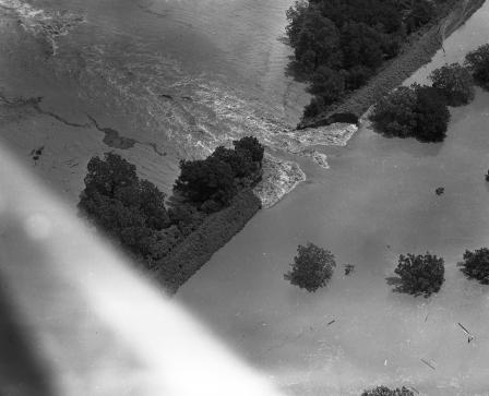 Fort Worth flood of 1949 showing a break in an earthen dam