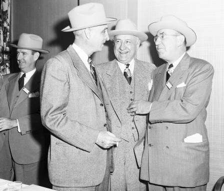Amon Carter, center, with two Kansas City business men. Mayor William E. Kemp, left, and Kearney Wornall