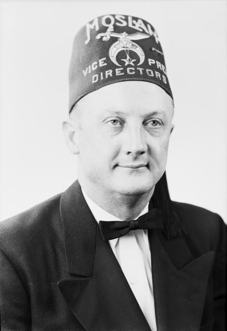 Moslah Vice President Director Frank Ellis wearing a fez