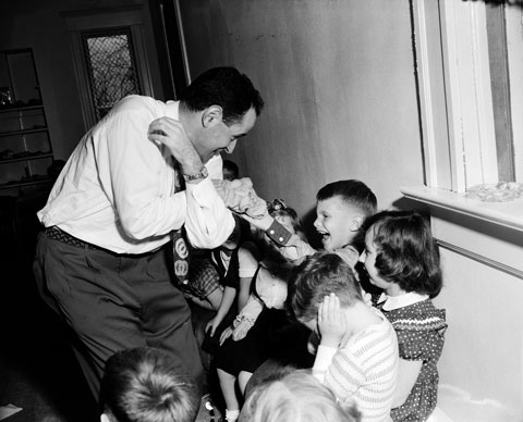 entertainer with children at a party