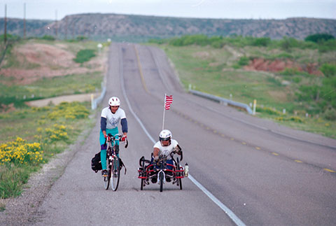Rob Bryant RowCycles and brother, Steve, bicycles on US 180 in West Texas