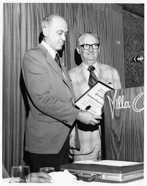 president Wendell Nedderman receives Texas Governor Dolph Briscoe award