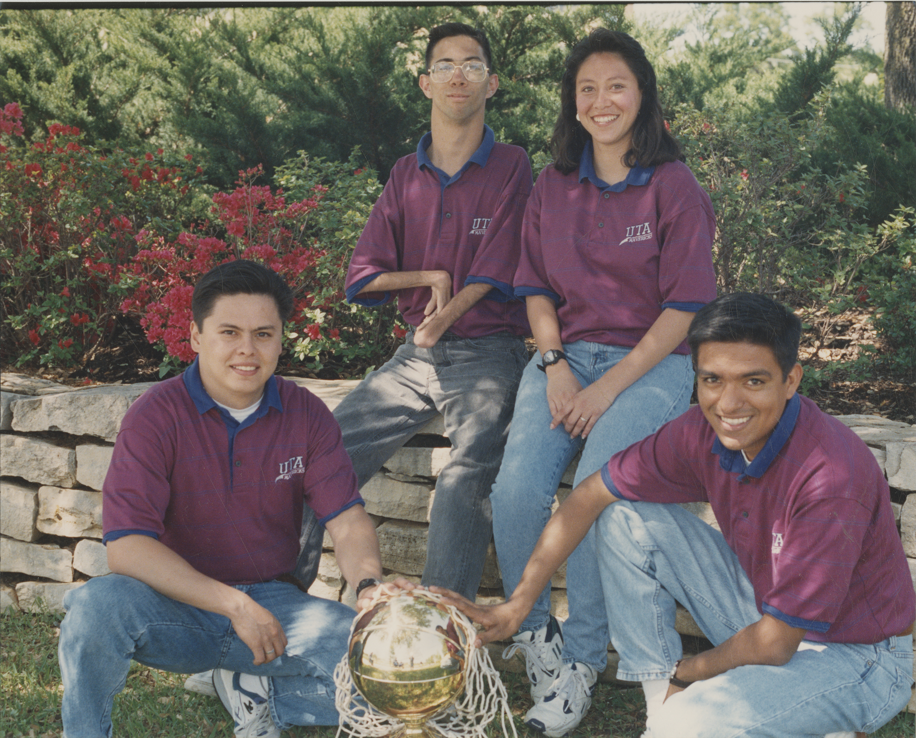 University of Texas at Arlington's Movin' Mavs men's wheelchair basketball team assistants pose for a photograph