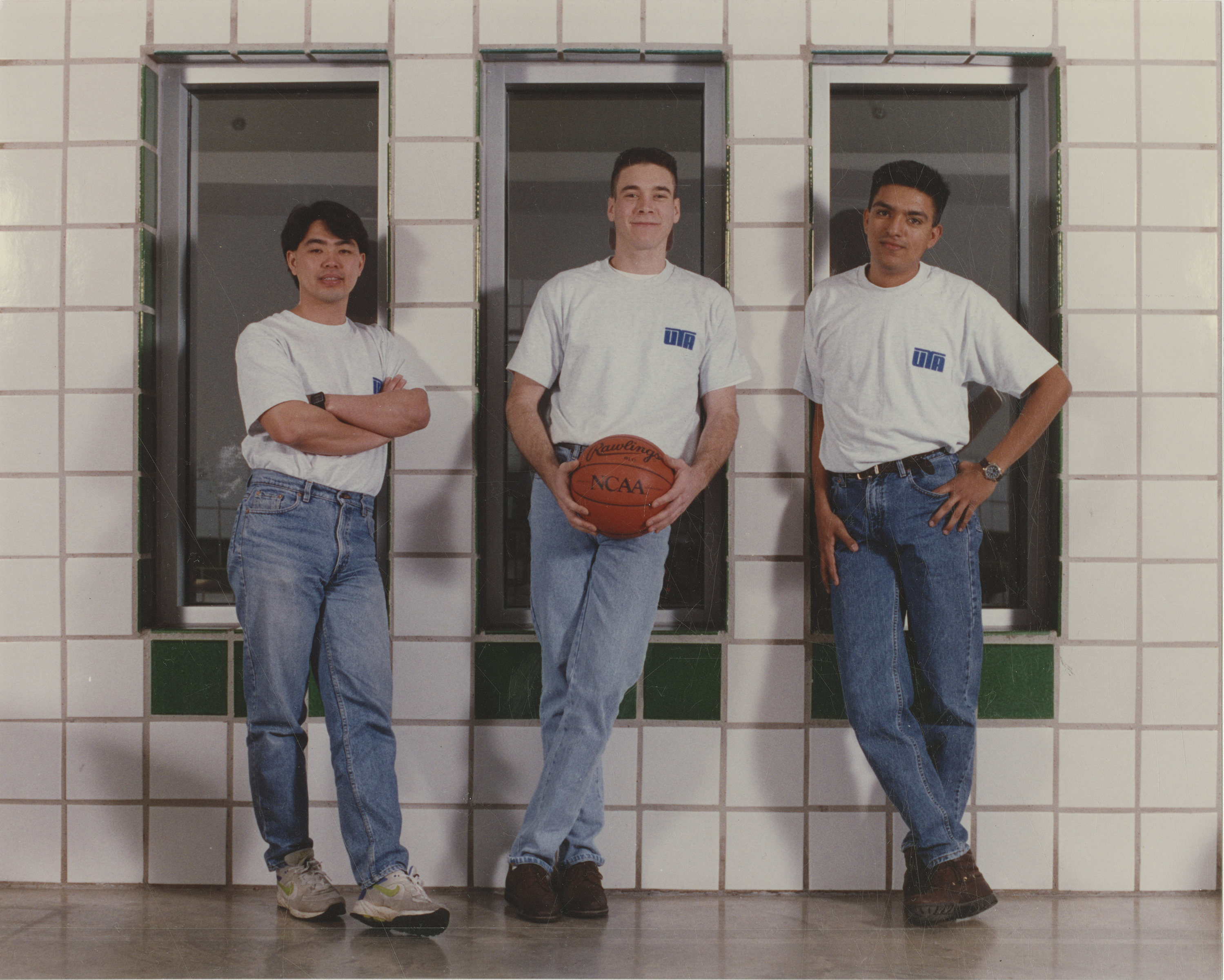 Chee He, Juan Pulido and Lee Castillo, assistants to the champion Movin' Mavs 1992 basketball team