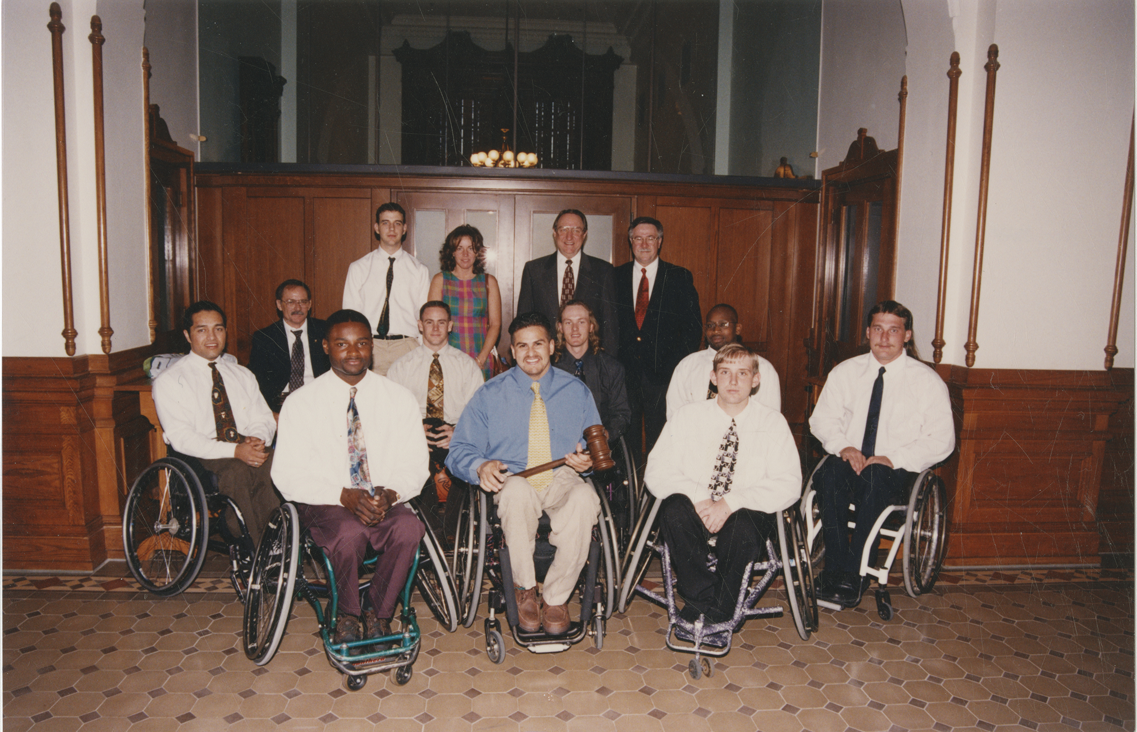 University of Texas at Arlington's Movin' Mavs men's wheelchair basketball team pose for a photograph