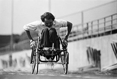 man racing in wheelchair