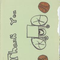 Thank you card signed by children with drawing of wheelchair and basketballs