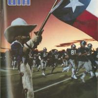 Mascot and football team on the cover of the December 1984 UTA Magazine
