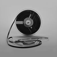 Black and White photo of a reel-to-reel tape