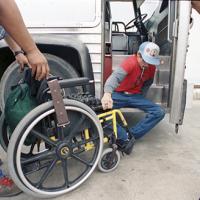 Lonnie Smith, disabled protester, seeking wheelchair lifts to buses