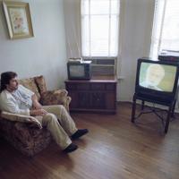 At HEADS UP House,a resident enjoys a television show