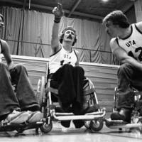 Jim Hayes with two unidentified athletes in wheelchairs