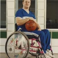 Color photograph of University of Texas at Arlington Movin' Mavs basketball player Dennis Palmer