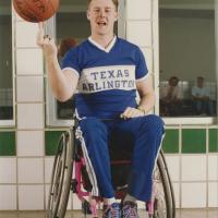 Color photograph of University of Texas at Arlington Movin' Mavs basketball player Jason Van Beek