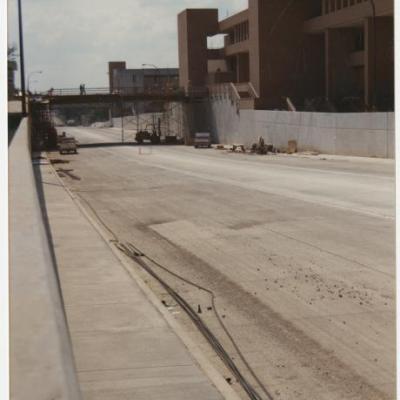 Construction on the depression of Cooper Street and construction of elevated pedestrian walkways on the campus of UTA