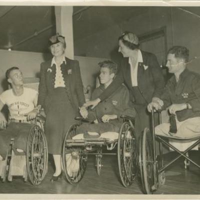 Helen Keller visiting patients at McCloskey General Hospital