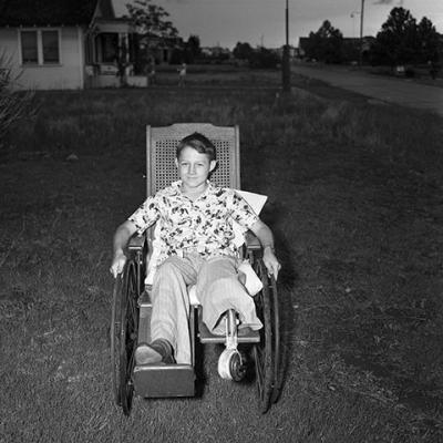 Harold Craig in a wheelchair