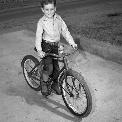 Brent Berryman riding his bicycle.