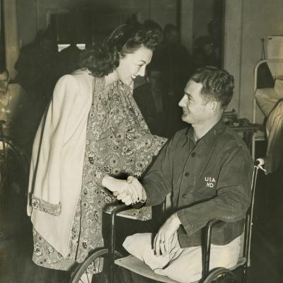 Singer Ginny Sims meets Staff Sergeant Warren C. Cowen at McCloskey General Hospital