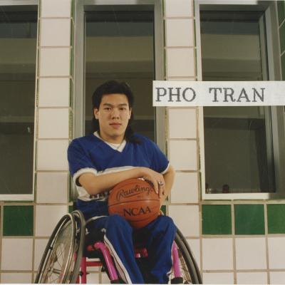 Color photograph of University of Texas at Arlington Movin' Mavs basketball player Pho Tran